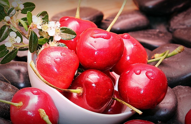 Healthy and freshly plucked cherries in a bowl